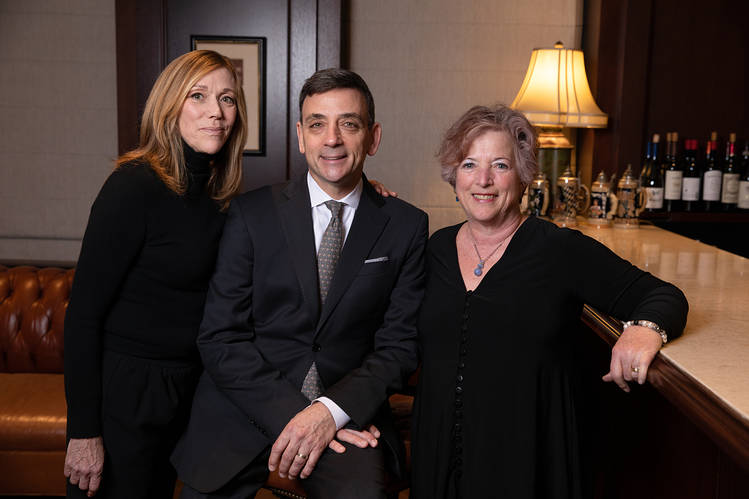 Stephen Wald with his new half-sister Julie Kalt Gale (right) and the sister he grew...